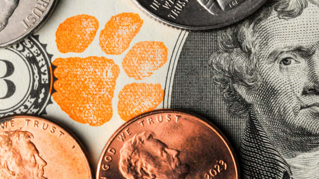 Clemson football fans put money into traveled city revenues, and it started in 1977 in Atlanta. The tradition of fans bringing their orange stamped two-dollar bills lives on.